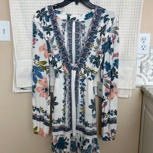 Free people tunic top.  Brand new.  Very flowy and spring colors.